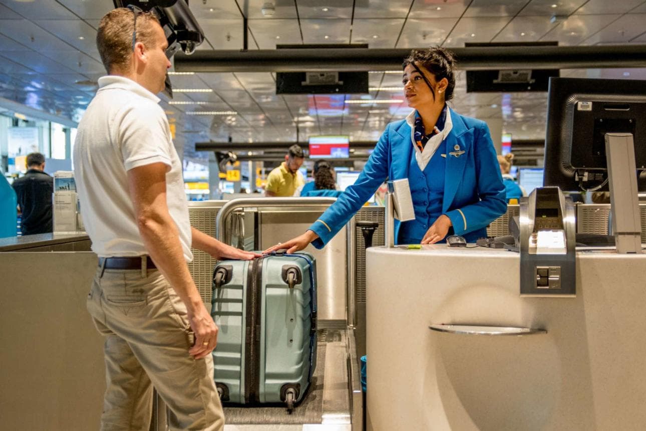 Traveler with carry-on baggage at the airport